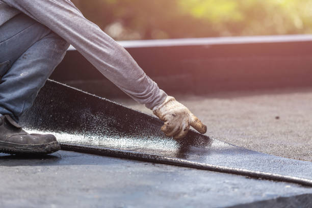 Professional Basement Waterproofing technician working in Lockport, KY